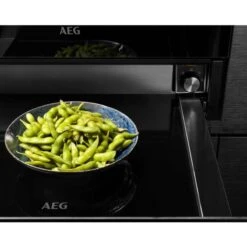 AEG KDK912924M 29cm Warming Drawer - Black -Home Kitchen aeg kdk912924m warmed greens on base open front view