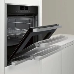 Neff N90 B48FT78H0B Bulit In Single Slide & Hide Electric Oven With Fullsteam & Home Connect - Stainless Steel -Home Kitchen n e neff n90 b48ft78h0b slide and hide electric oven lifestyle2