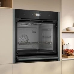 Neff N90 B64CS51G0B Bulit In Single Slide & Hide Electric Oven With Home Connect - Black With Graphite Grey Trim -Home Kitchen n e neff n90 b64cs51g0b slide and hide electric oven lifestyle2