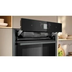 Neff N90 B64FT53G0B Bulit In Single Slide & Hide Electric Oven With Steam & Home Connect - Black With Graphite Grey Trim -Home Kitchen n e neff n90 b64ft53g0b slide and hide electric oven lifestyle4
